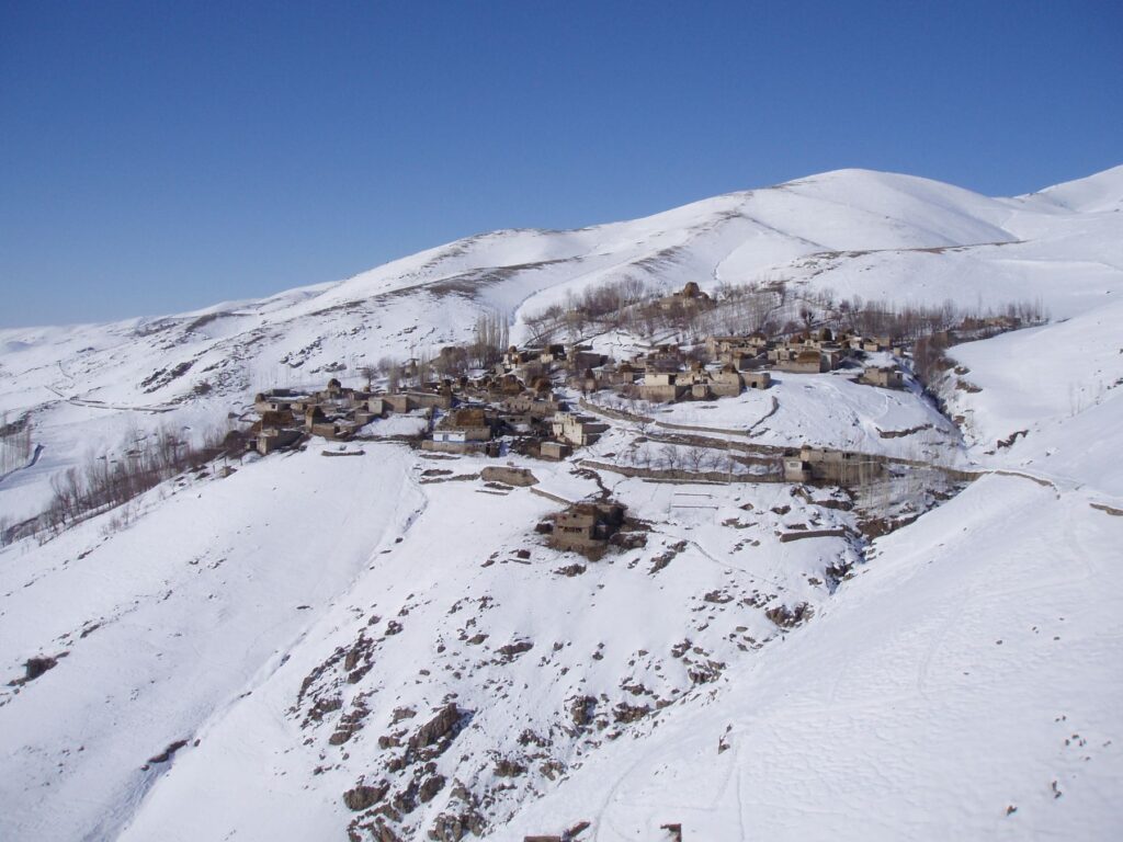 Remote mountain village in wintertime in Afghanistan, visited by Be Team International's Cure Hospital outreach team
